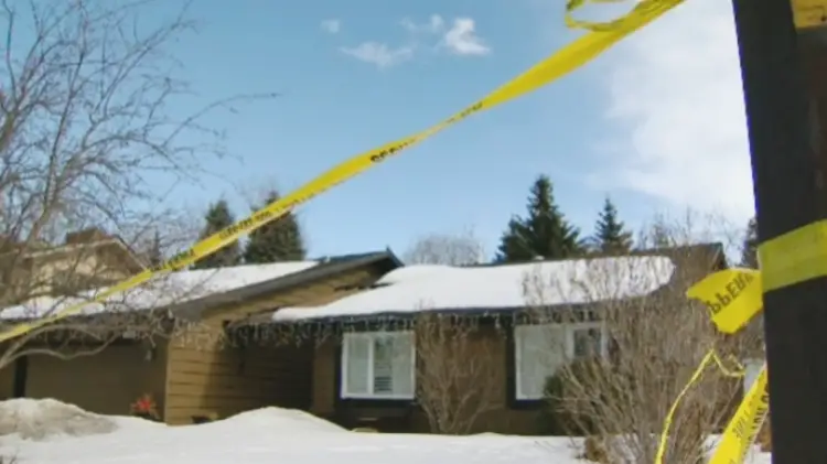 Don and Roxanne Carlson: house with crime scene tape 