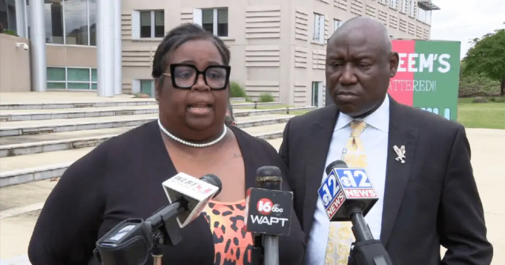 Tiffany Carter, mother of Rasheem Carter, and her attorney, Ben Crumb at a press conference.